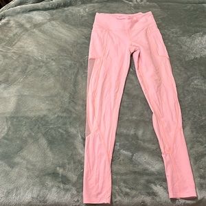 Bright pink leggings.